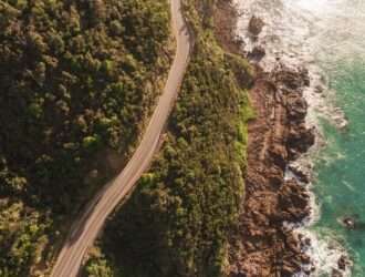 aerial view of road and sea