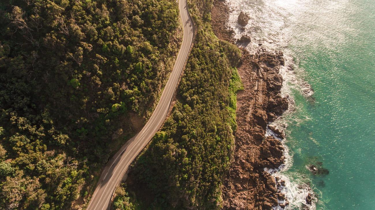 aerial view of road and sea