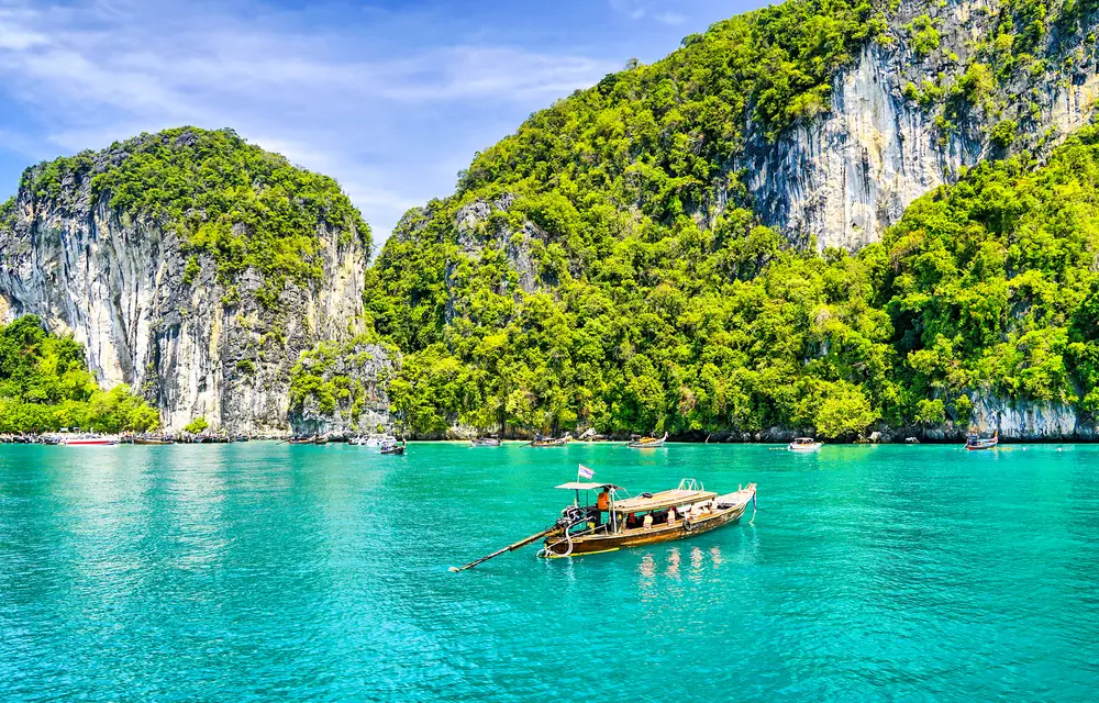Boat navigating the sea in Phuket.